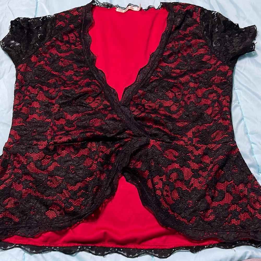 Red blouse with black lace like material